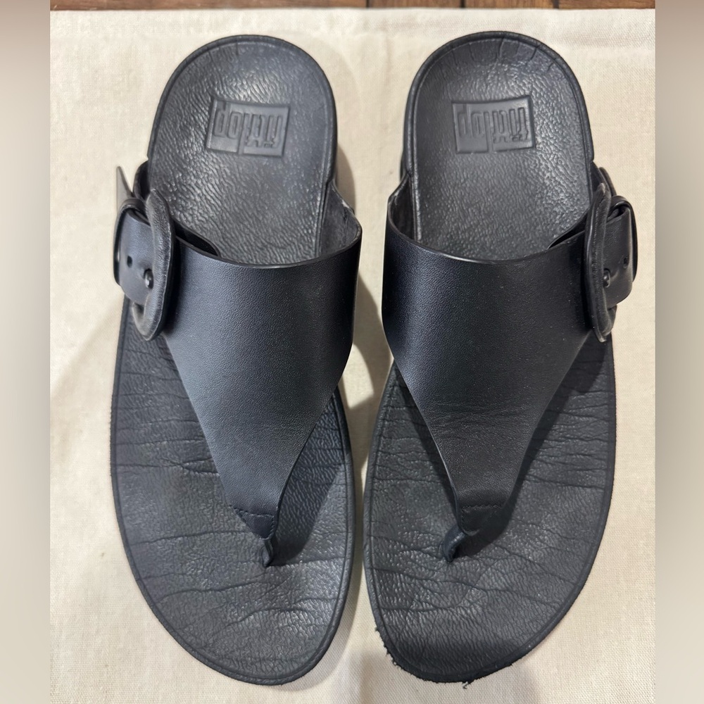 FitFlop Black leather flip flops with buckle